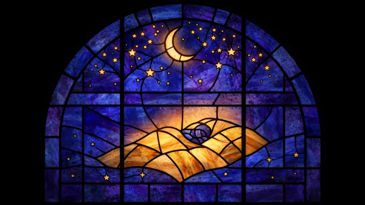 Stained-glass window of a crescent moon and stars above a sleeping figure under an amber glowing blanket